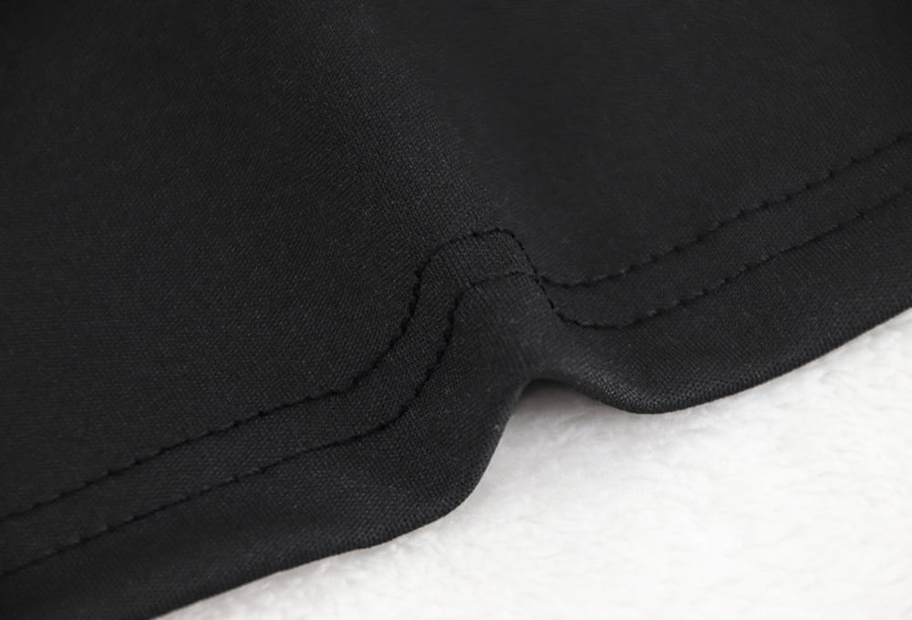 black velvet v-neck evening dress fabric with neat matching stitching along the edge
