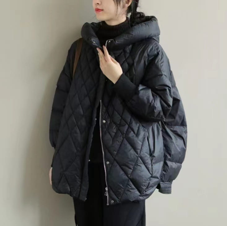 black quilted white duck down puffer jacket with a hood and silver zipper designed as a loose hooded winter coat.