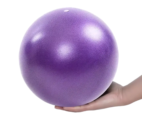 A smooth matte purple 25 cm exercise ball for core fitness and yoga exercises