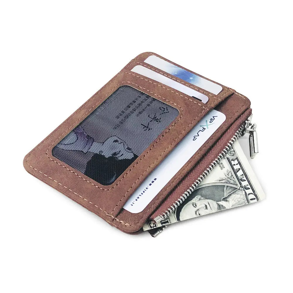 Brown pu leather zippered card holder wallet for men with a mesh window displaying an anime- style illustration three card slots and a zipper compartment holding cash.