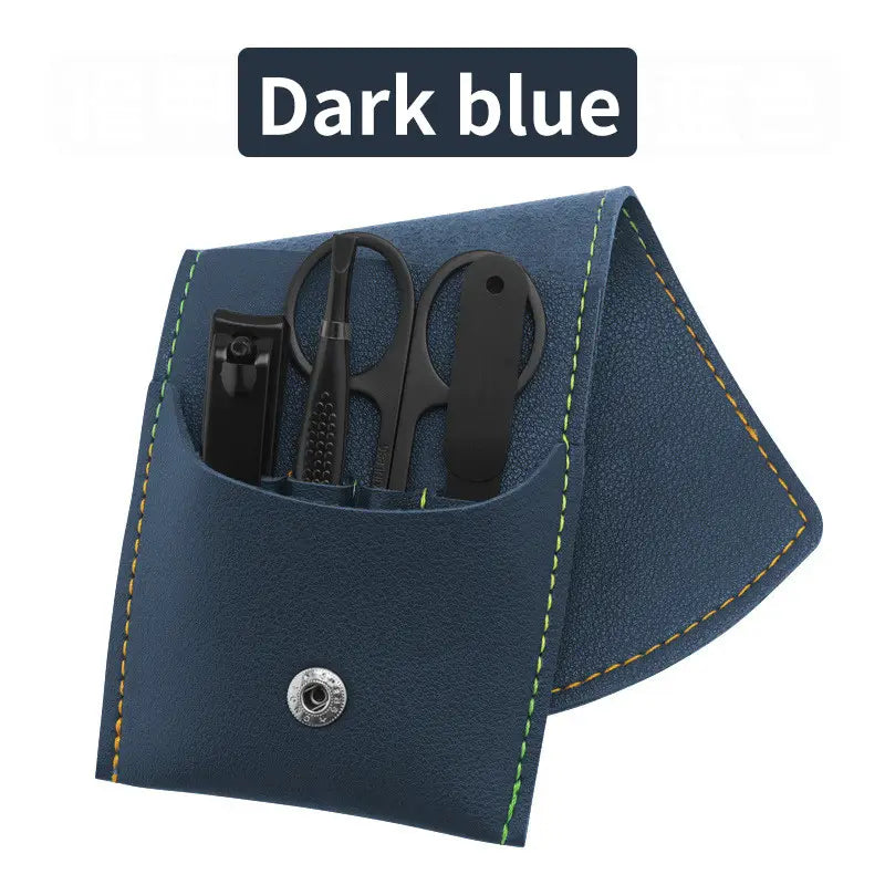 Dark blue leather 16 piece professional manicure and pedicure kit with black metal tools and yellow stitching.