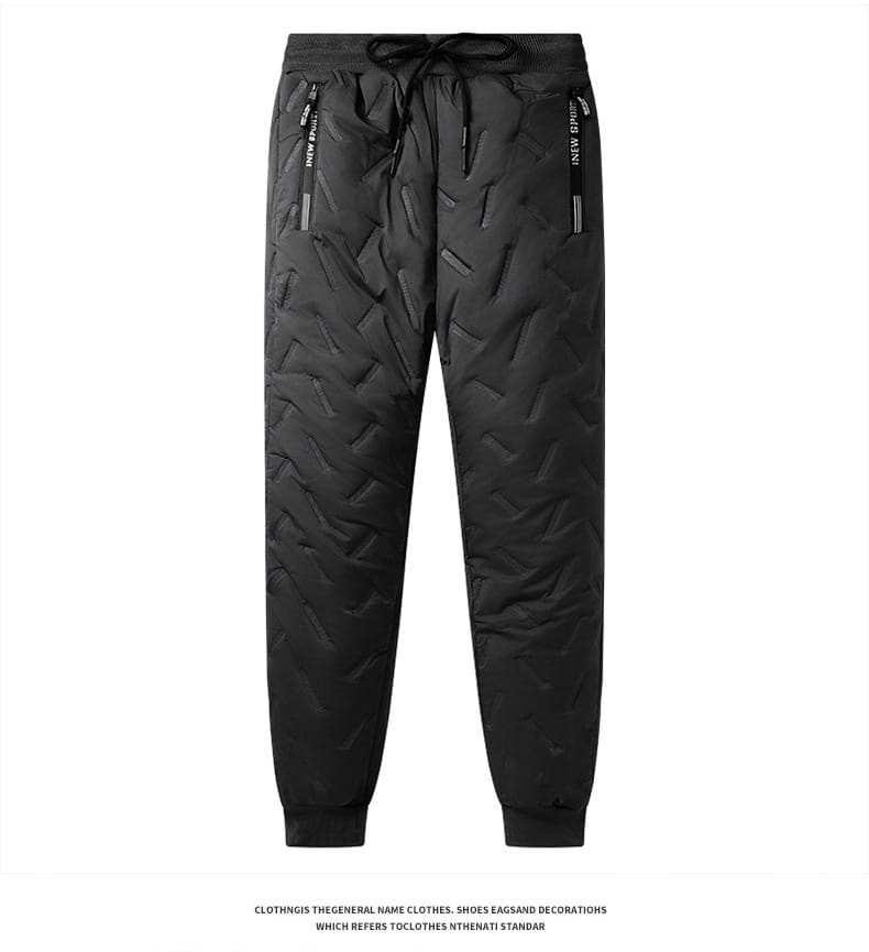 Schwarze gesteppte Jogger mit geometrischem Muster und seitlichen Reißverschlüssen als Teil eines Herren-Thermo-Winteranzugs in drei Teilen mit Steppung.