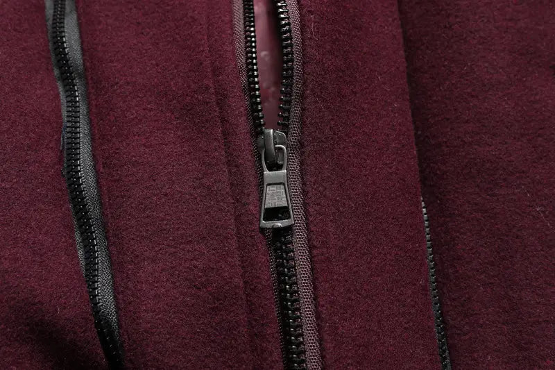 Men wool winter overcoat quilted jacket with maroon fleece zipper featuring black teeth and a metallic pull tab.
