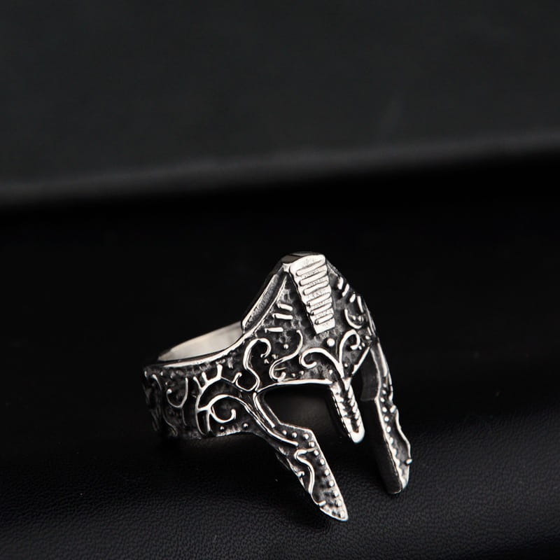 Silver Spartan warrior helmet engraved stainless steel ring with intricate detailing and a textured metallic finish.