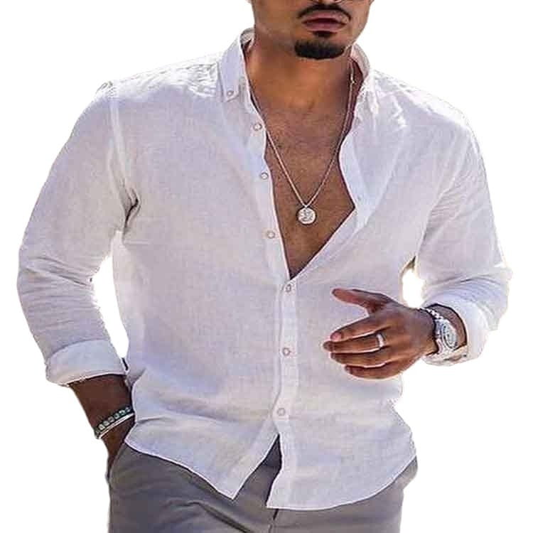 Chemise décontractée en lin et coton, avec boutons, manches retroussées et coupe légèrement ample.