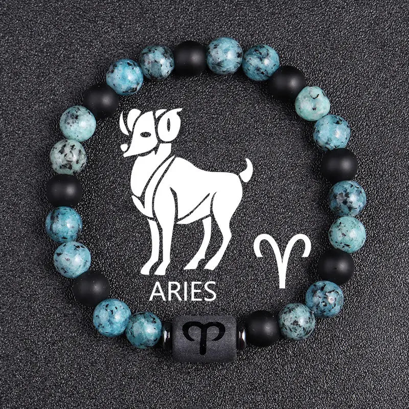 Natural stone 12 constellation zodiac obsidian bracelet featuring an Aries-themed beaded design with alternating turquoise and black matte beads and a central black stone charm engraved with the Aries symbol.