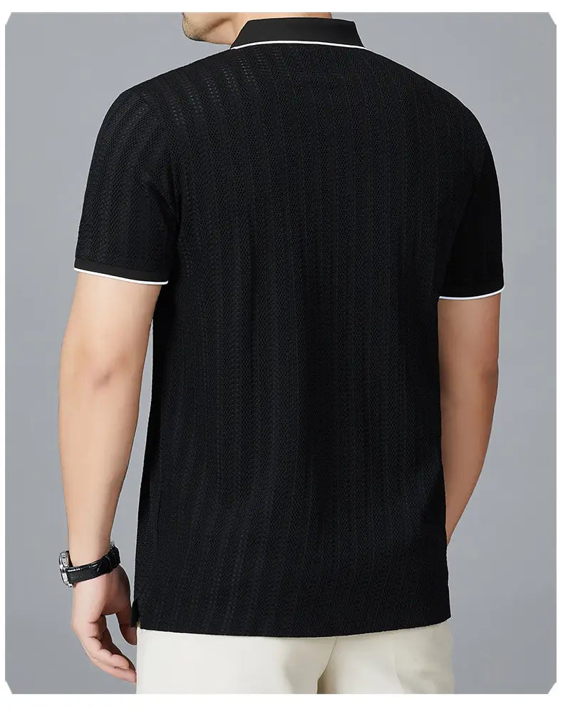 Men’s textured ice silk black polo shirt with short sleeves and white contrast trim on collar and sleeve cuffs.