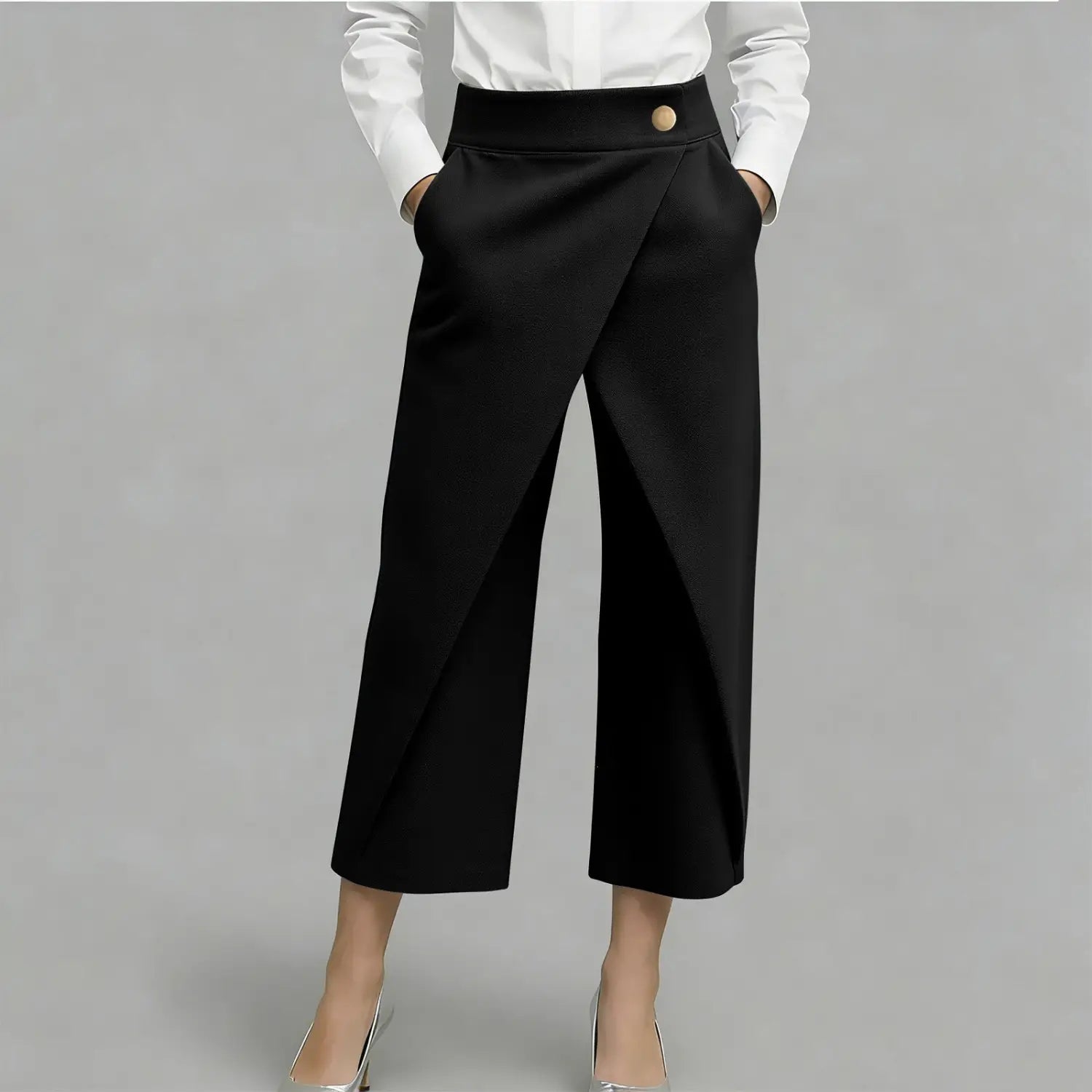 schwarze High-Waist-Wide-Leg-Hosen mit goldfarbenem Knopfverschluss und maßgeschneidertem Schnitt.