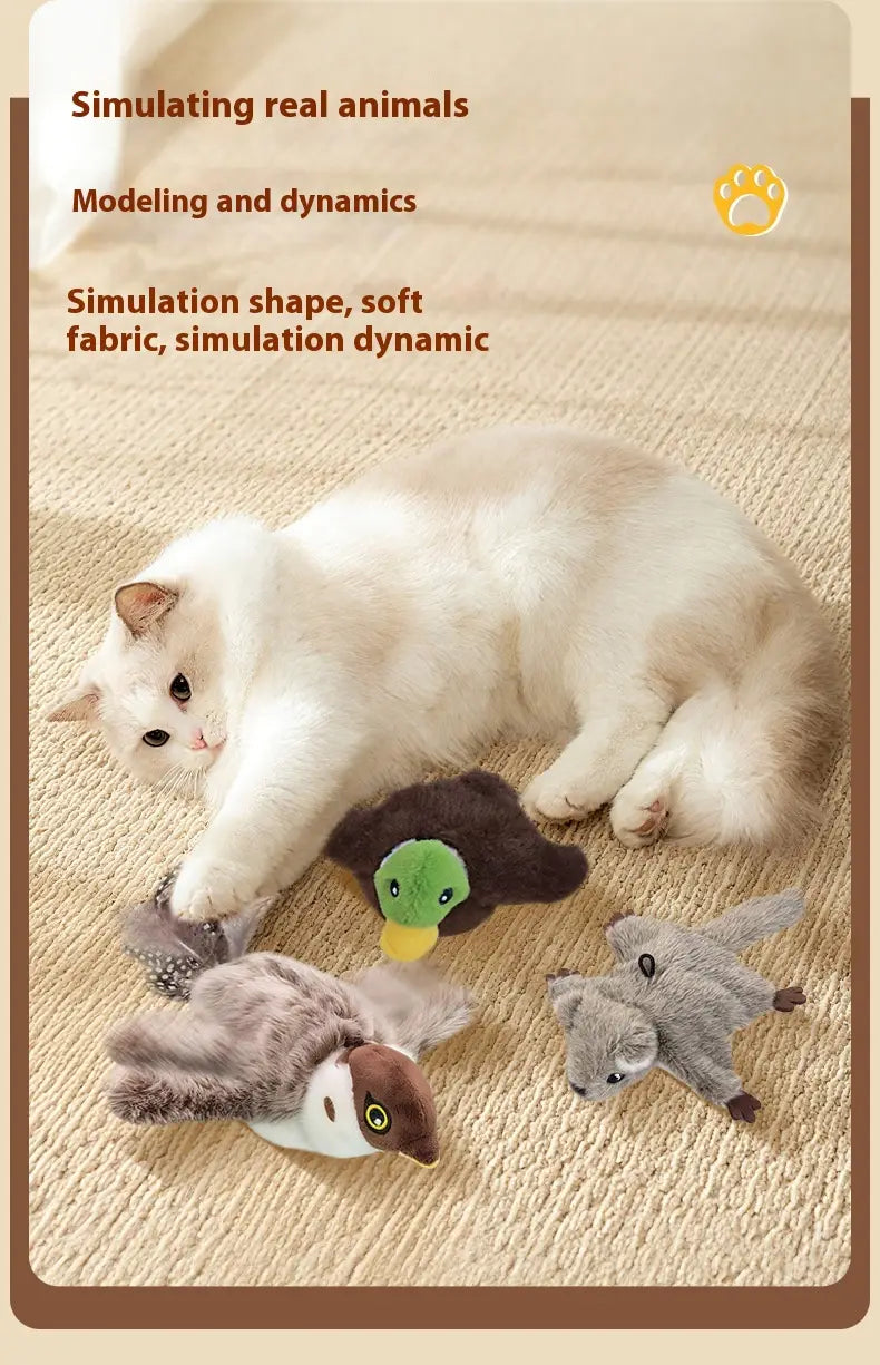 fluffy white cat lying beside interactive bird cat toy automatic sounding plush sparrow made of soft fabric with realistic shapes and colors.