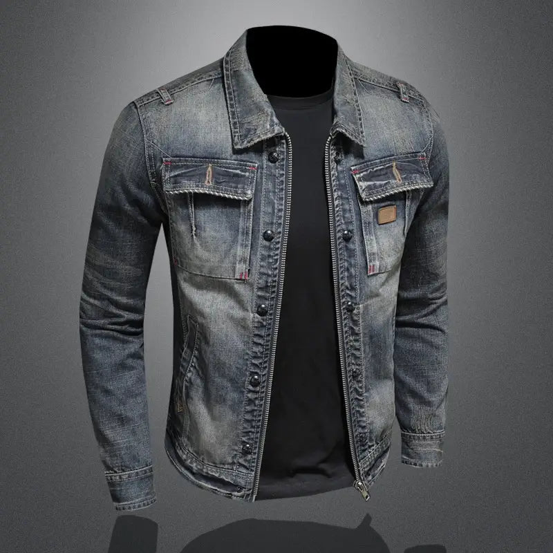 A faded blue distressed dark wash denim jacket for men featuring a classic collar, button and zipper closure, and two chest pockets with stitched detailing.
