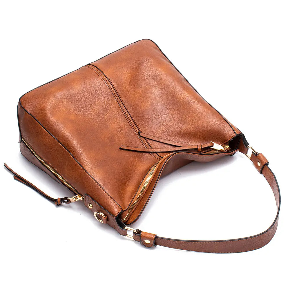 Premium brown leather hobo crossbody bag with gold-tone zipper and adjustable strap.
