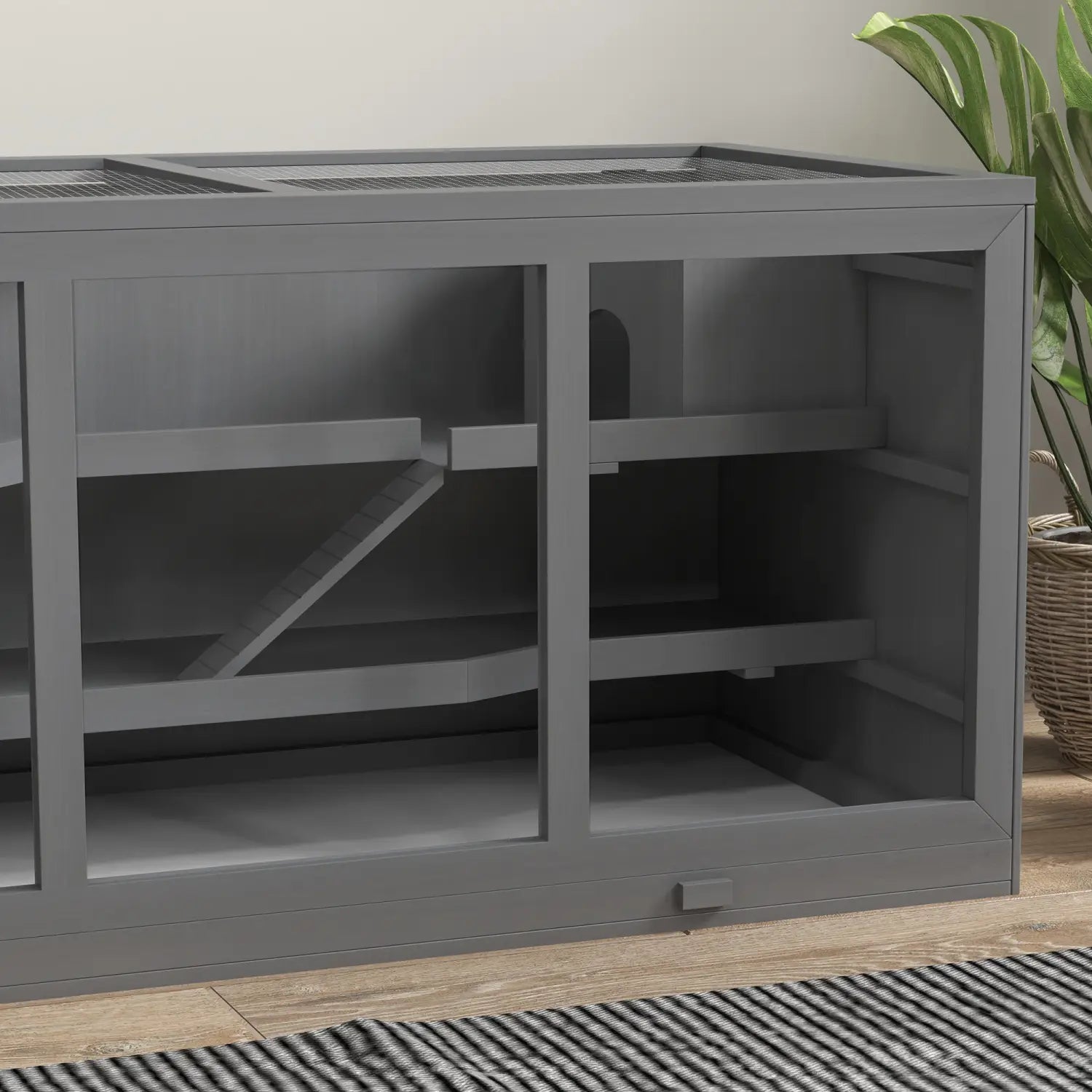 Gray wooden hamster cage with glass panels and internal shelves for a multi-level small animal habitat.