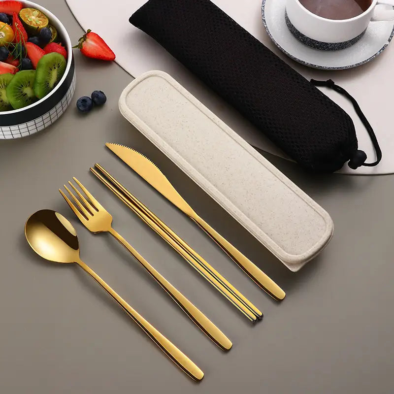Gold-colored stainless steel portable cutlery set with a sleek modern design and included case.