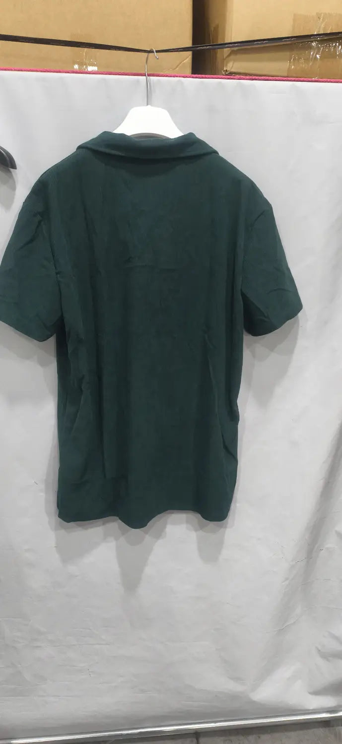 Dark green short-sleeved corduroy polo shirt with collar and buttoned placket from men corduroy short sleeve polo shorts set.