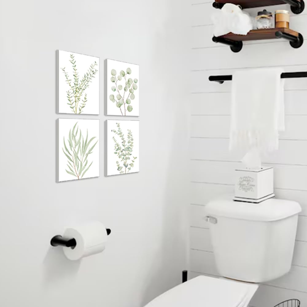 set of four botanical canvas wall art prints featuring delicate green eucalyptus foliage on white backgrounds in framed decor style for home decoration