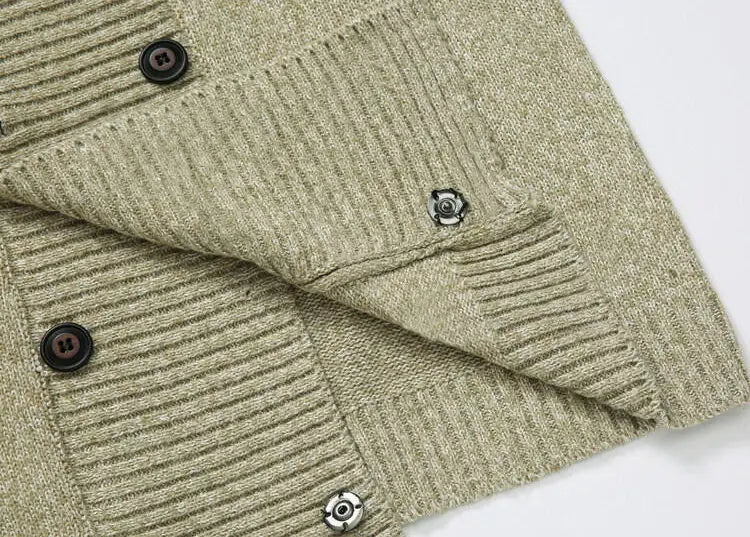 Men’s double-breasted knit cardigan in olive green ribbed knit fabric featuring contrasting black and silver buttons.
