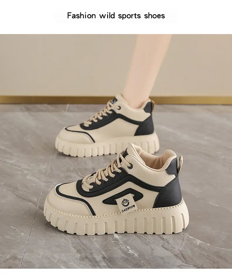 Cream-colored women’s chunky platform breathable high top sneakers with ridged sole and beige suede accents.