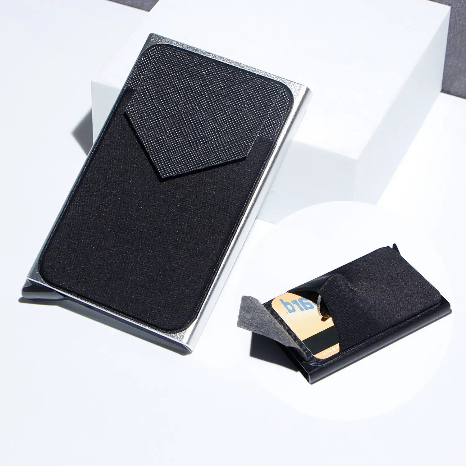 black textured minimalist RFID blocking aluminum multi card wallet with sleek silver metallic frame and refined design