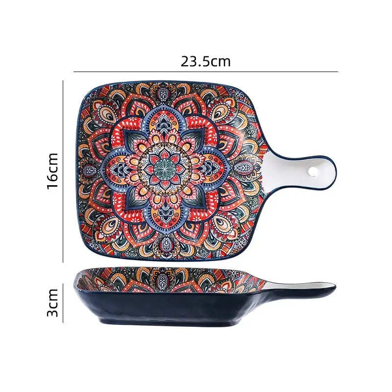A square ceramic mandala serving bowl hand painted with a vibrant intricate pattern in reds oranges and blues and with a 400ml capacity.