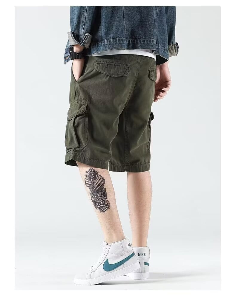 Men’s relaxed fit olive green cargo shorts featuring multiple pockets and a comfortable fit.