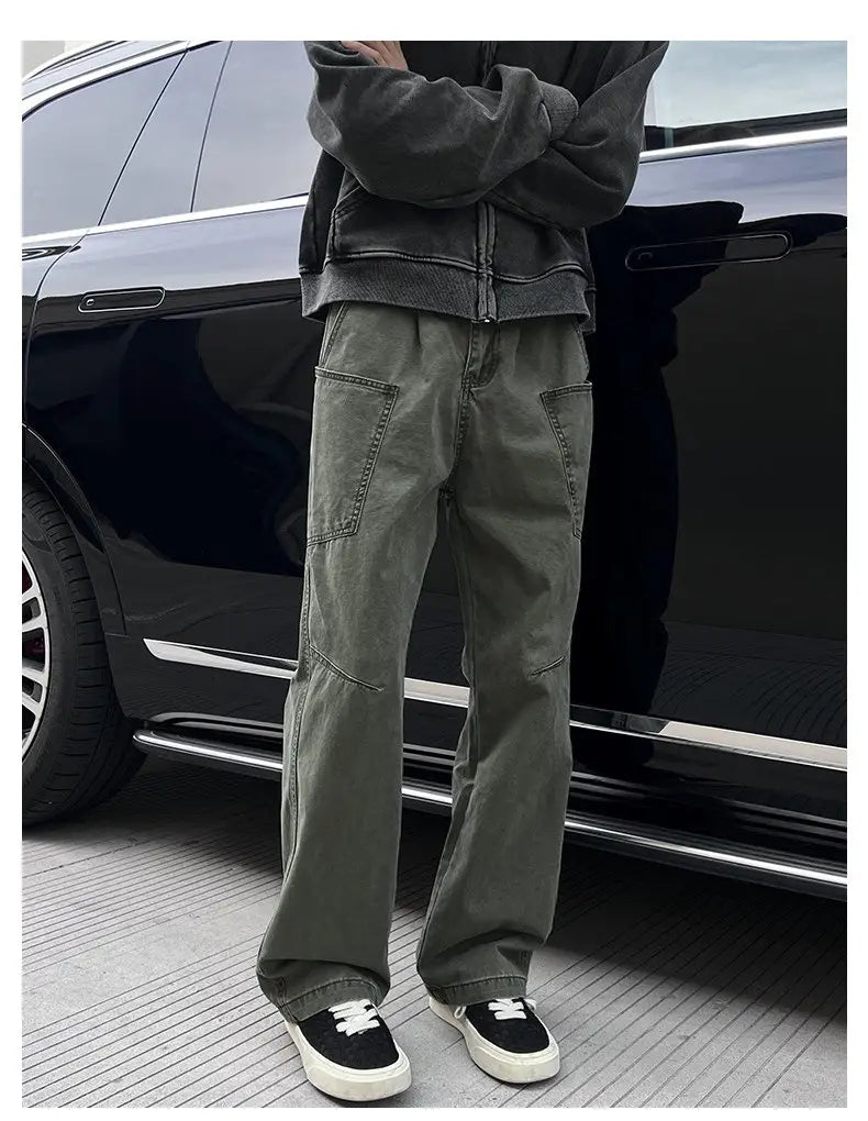 Olive green cotton cargo pants for men featuring multiple pockets and a relaxed fit suitable for workwear.