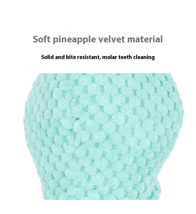 a mint green soft pineapple velvet toothbrush cleaner with a textured bumpy surface featured as part of the squeaky octopus plush pet toy with textured fabric