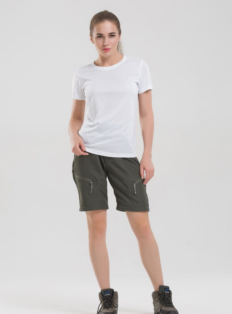 olive green cargo shorts with side pockets and zipper details designed as convertible tactical hiking pants for outdoor use