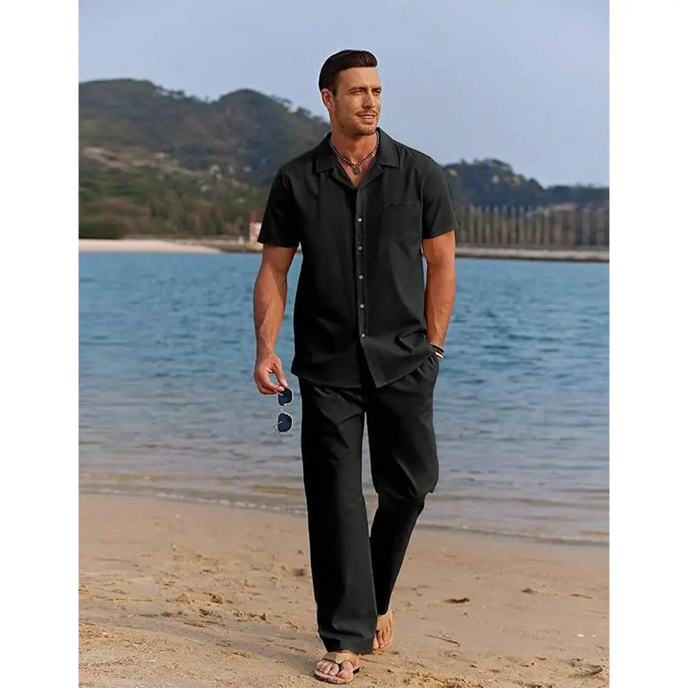 black short-sleeved button-up shirt with collar and chest pocket from men short sleeve shirt and trousers set made of lightweight fabric for casual wear