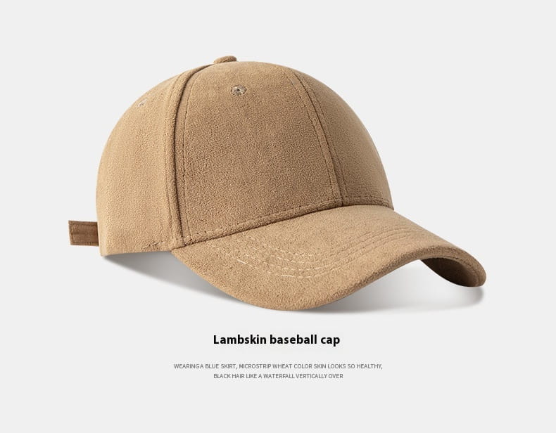 Tan lambskin suede baseball cap with a soft minimalist design, curved brim, and adjustable strap.