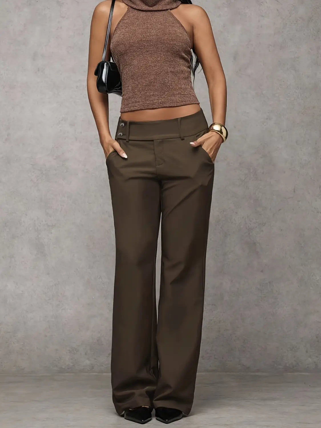Brown high-waisted wide-leg casual trousers with a sleek tailored fit and buttoned belt loops ideal for workwear.