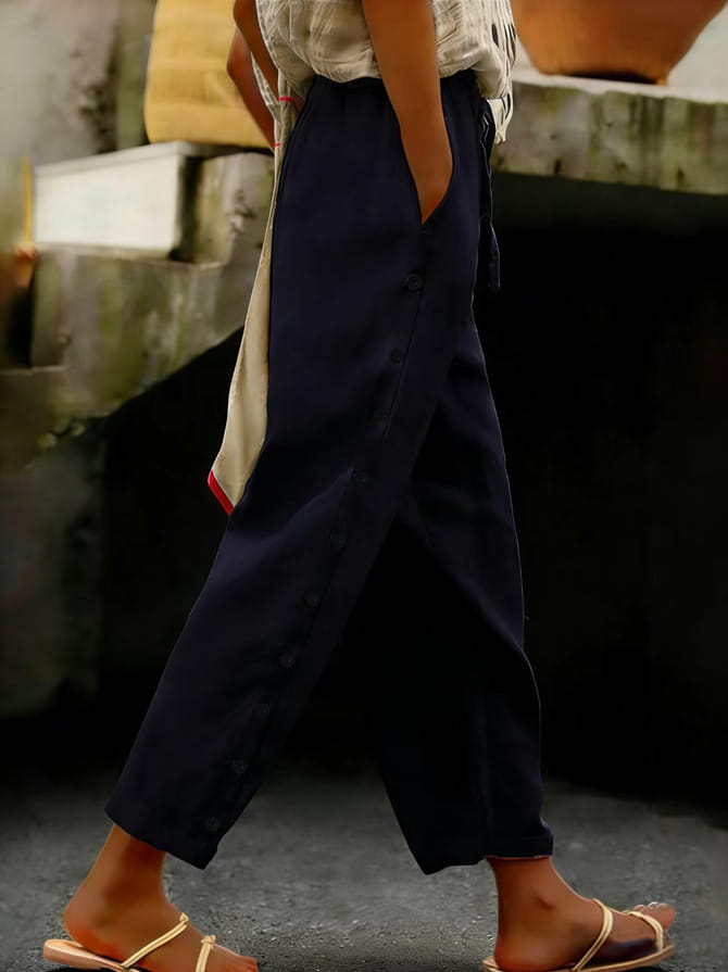 Dark navy cropped patchwork button casual pants for women featuring wide-leg trousers with button detailing and a relaxed casual fit.