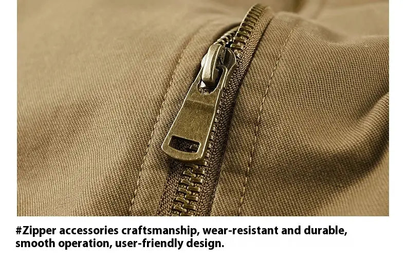 Men cotton shearling bomber jacket featuring a bronze-colored metal zipper with a sturdy pull tab set into khaki fabric.