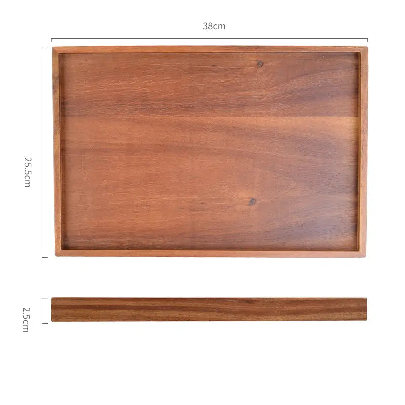 Acacia wood rectangular serving tray with a warm medium brown finish and visible wood grain hand polished for durability and elegance.