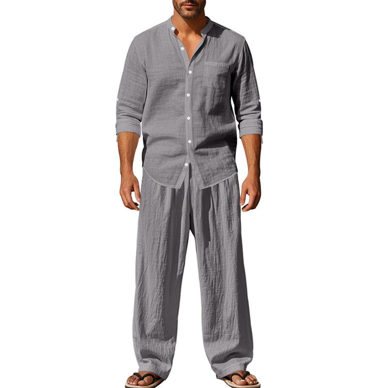 Set aus Herren-Leinenhemd und -hose mit grauem Leinenhemd mit Knopfverschluss, umgeschlagenen Ärmeln und einer Brusttasche.