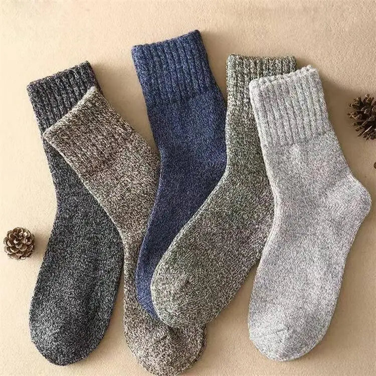 four cozy men’s rabbit fur winter ankle socks in muted gray blue and greenish gray tones with ribbed cuffs and a soft textured knit finish