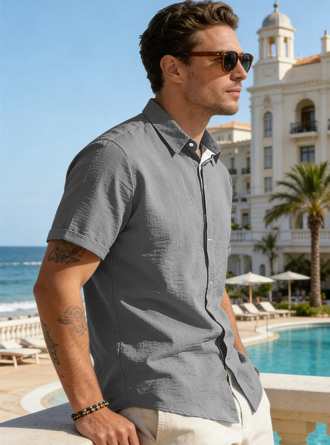 Gray short-sleeved button-down shirt made of textured bamboo linen fabric for men.