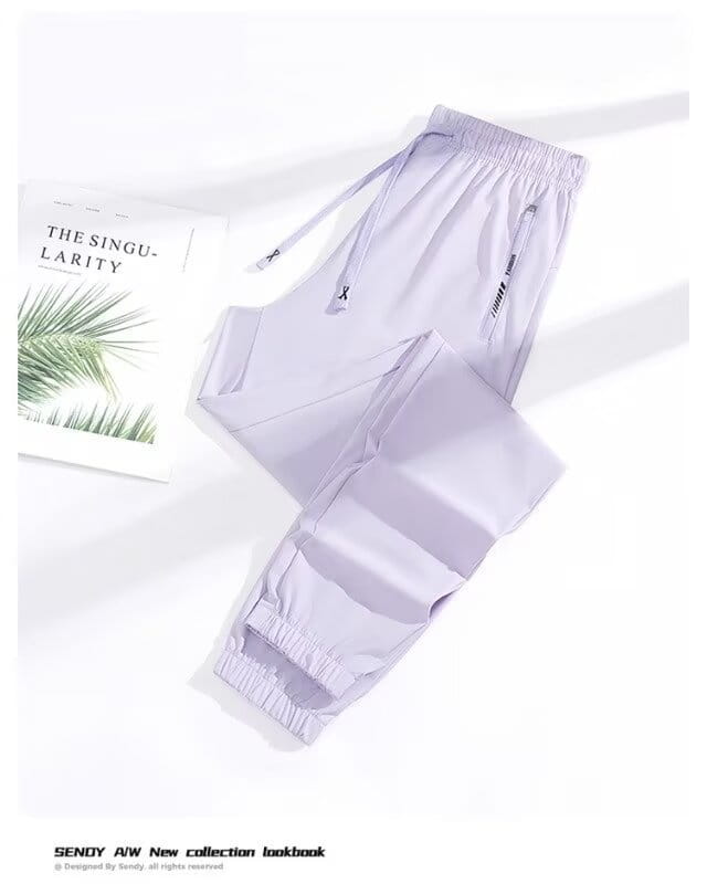 Light gray anti-mosquito casual athletic trousers featuring elastic cuffs and side pockets for comfortable activewear use.