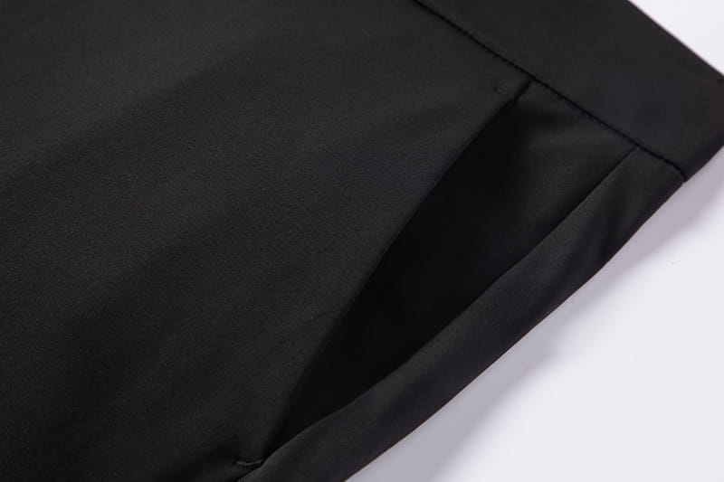 Black men plus size stretch casual pants made of sleek smooth fabric with clean stitching.