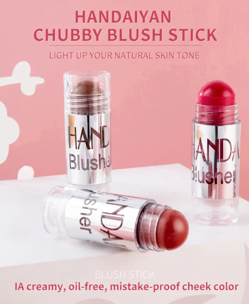 Handdaiyan chubby blush stick in clear cylindrical packaging with silver metallic accents and bold black lettering features a creamy oil-free long lasting face highlighter available in shades of brown and red.