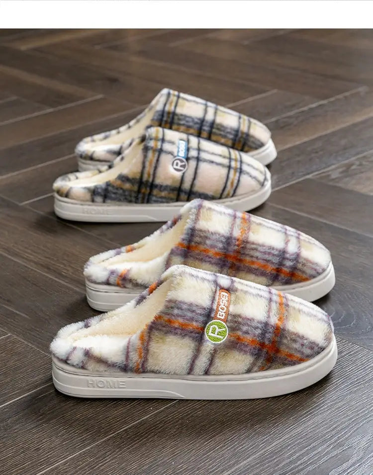 Unisex plaid fleece lined non slip indoor slippers featuring a soft white rubber sole and branded logo patches.