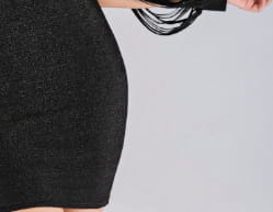 black textured mini skirt with a sleek form-fitting design featured with black sequin tassel sleeves in a mini dress style