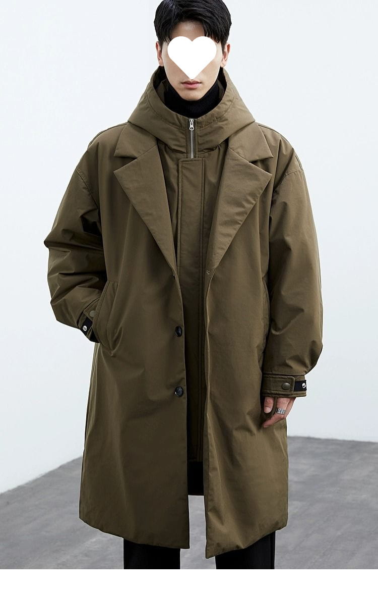 Men hooded trench coat in olive green with a zipper front and button closures designed as a false two-piece winter jacket.