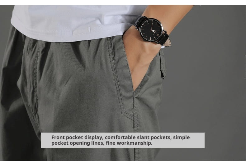 Men’s Japanese style cotton straight leg workwear pants paired with a black leather strap watch featuring a minimalist black dial and silver toned hands.