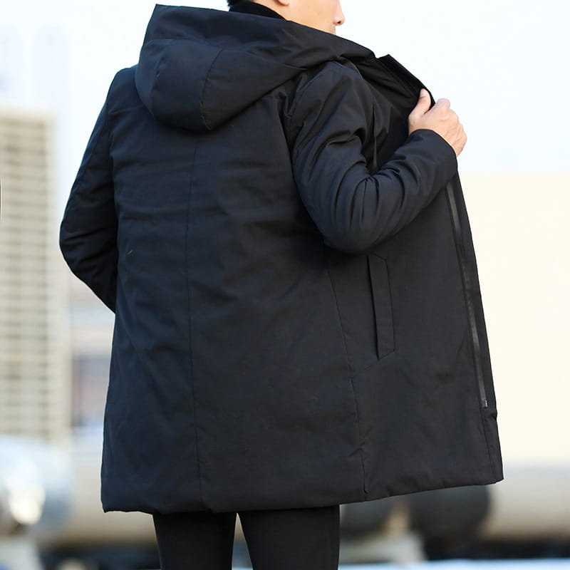 Black puffer coat with hood and zipper closure designed as a men thick hooded winter jacket for cold weather.