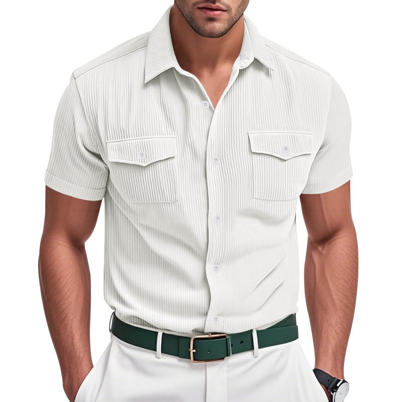 A crisp white loose corduroy short sleeve workwear shirt with vertical ribbed texture and two chest pockets.