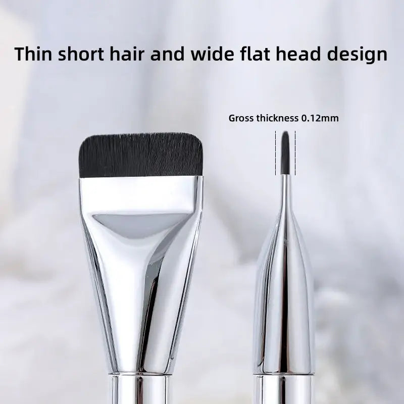 silver-handled ultra thin foundation brush with black bristles featuring a thin short hair and wide flat head design for traceless makeup application