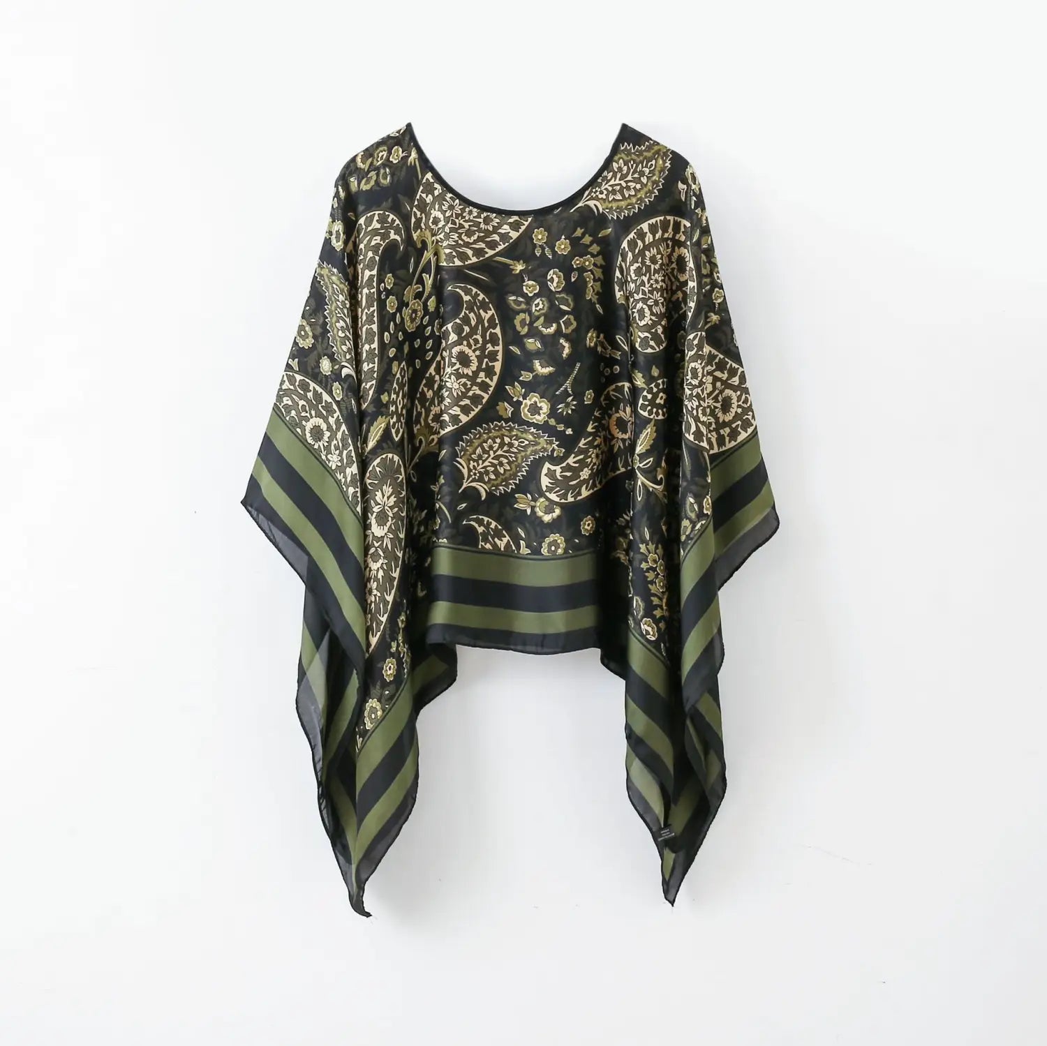 Black silk printed patterned pullover shawl cape outerwear featuring gold paisley and floral patterns with olive green and black striped cuffs.