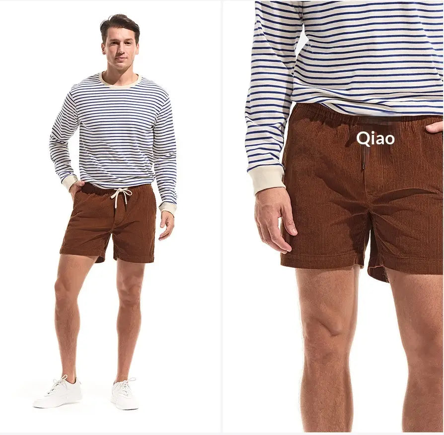 Brown cotton corduroy shorts with a drawstring waistband and qiao embroidery on the front for casual summer wear.
