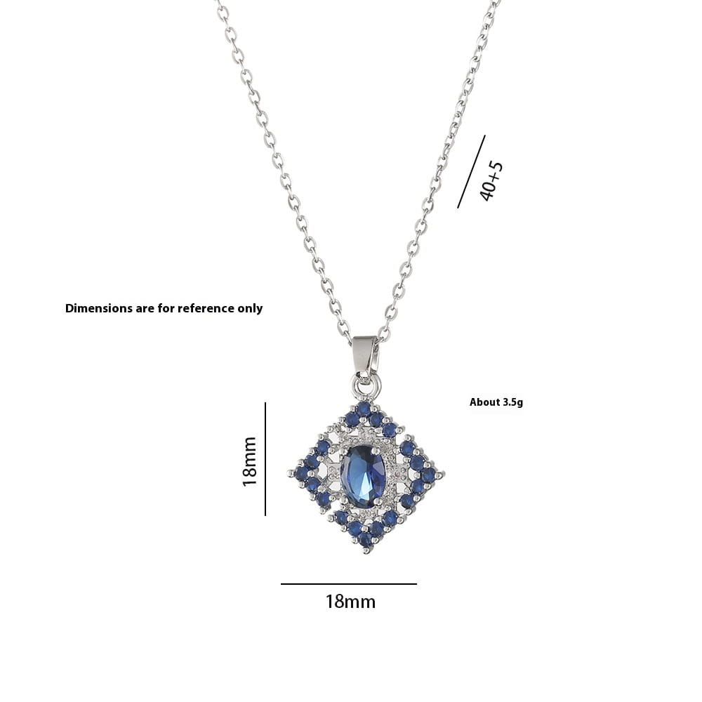 A silver-toned elegant blue zircon flower necklace featuring a diamond-shaped pendant with an oval blue gemstone surrounded by smaller blue stones set in a delicate titanium chain.