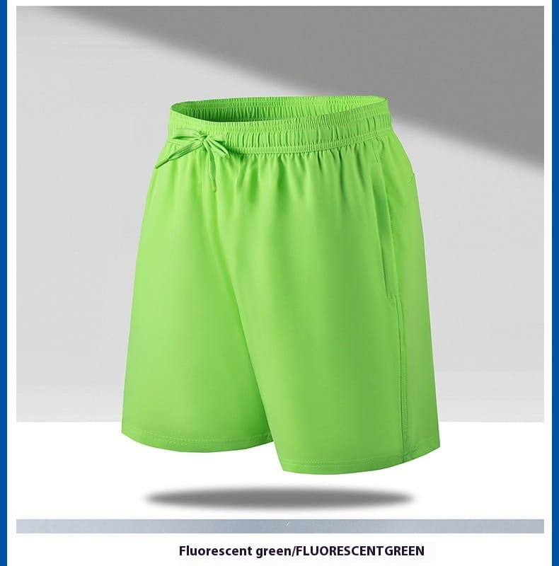 Men ice silk quick dry athletic shorts in fluorescent green featuring an elastic waistband and drawstring for adjustable comfort.